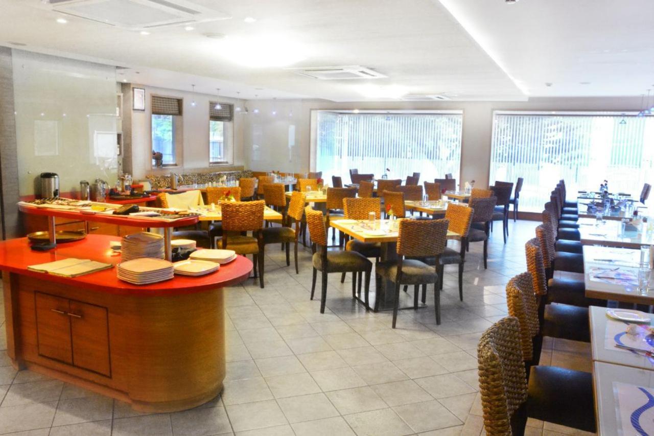 Ashraya International Hotel Bangalore Eksteriør bilde